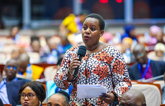Neema Lugangira speaking publicly
