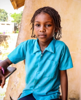 A children looking at the camera