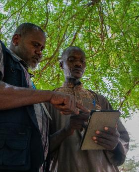 Some government officials checking the food stocks at a school in Zinder region.