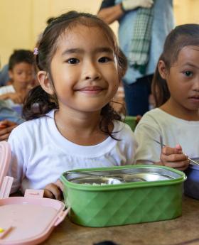 Kids eating their school meals in Philippines 