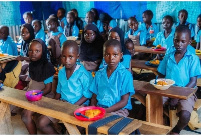 During a lunch break at Maple Leaf Transitional Learning Centre, Wassa in Abuja. The school meals programme in Nigeria is reaching learning sites for internally displaced children. 